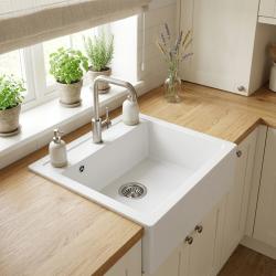 farmhouse-kitchen-sink-with-faucet-and-wooden-countertop